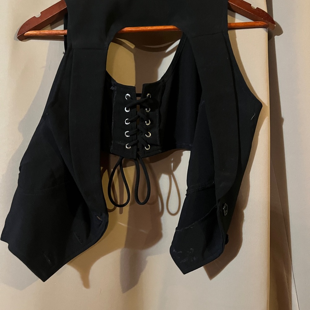 Black half vest.
